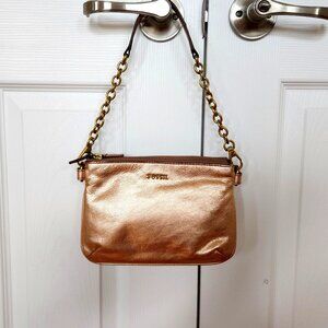FOSSIL METALLIC ROSE GOLD GENUINE LEATHER  WRISTLET PURSE.